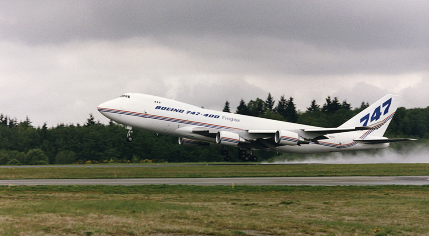 The transport version of Boeing 747, as shown above, after modifications, was envisioned to carry up to 10 Model 985 microfighters inside a dorsal hangar structure.